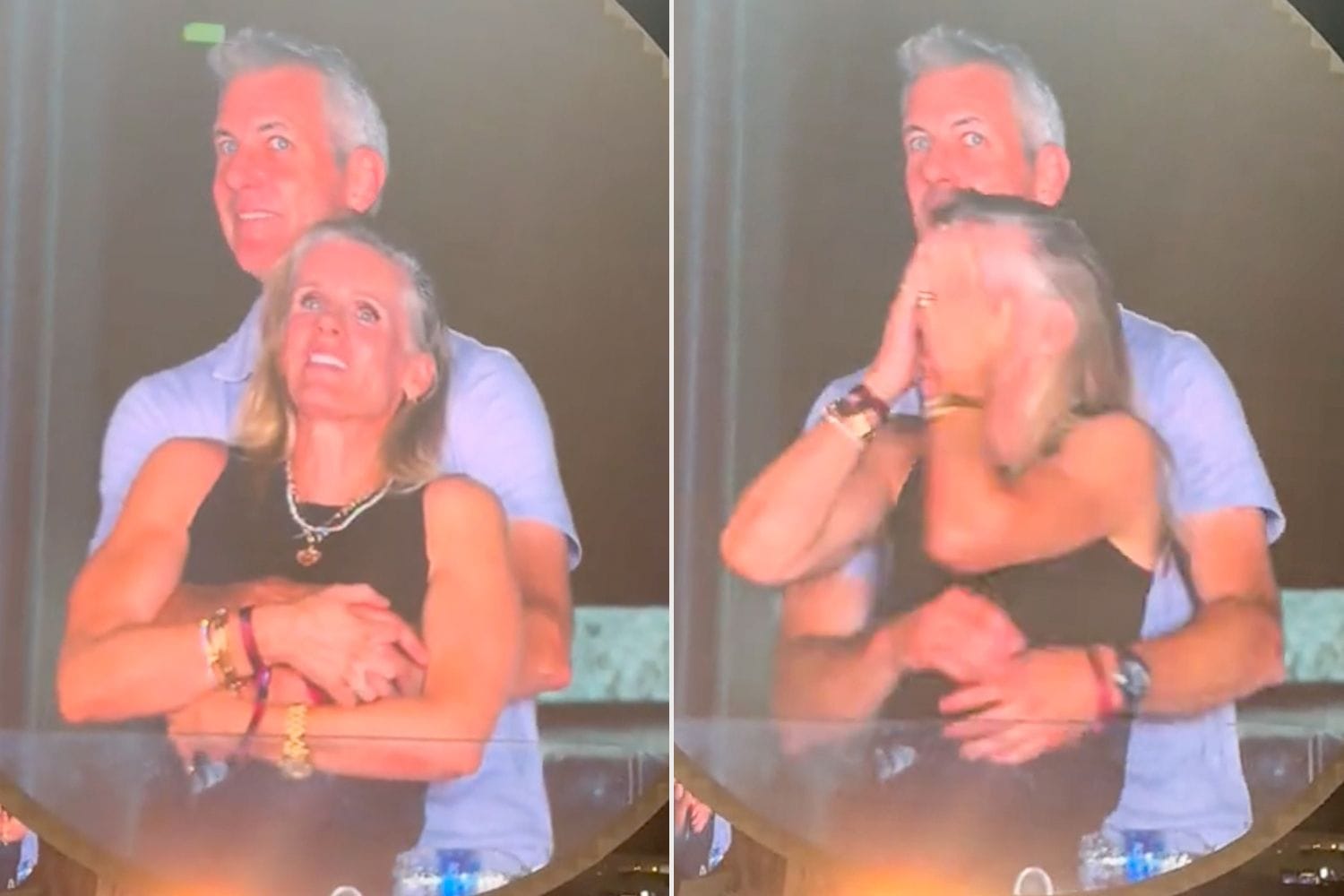 A couple caught on the kiss cam at a concert