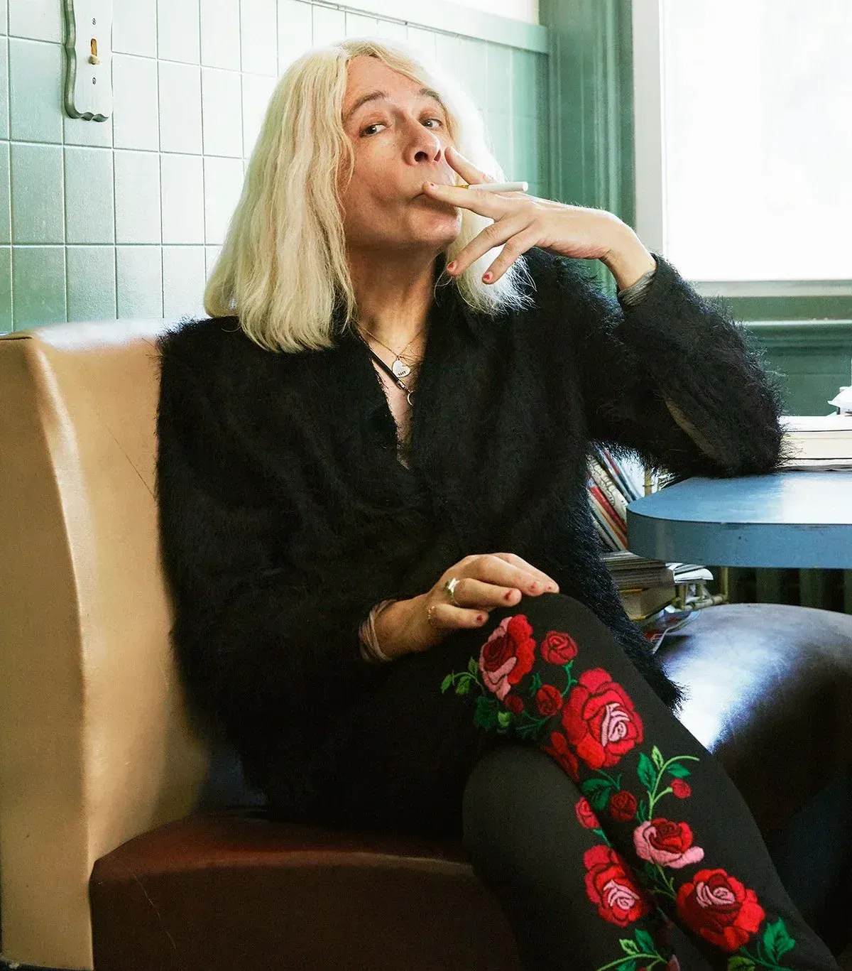 Lucy Sante smoking a cigarette