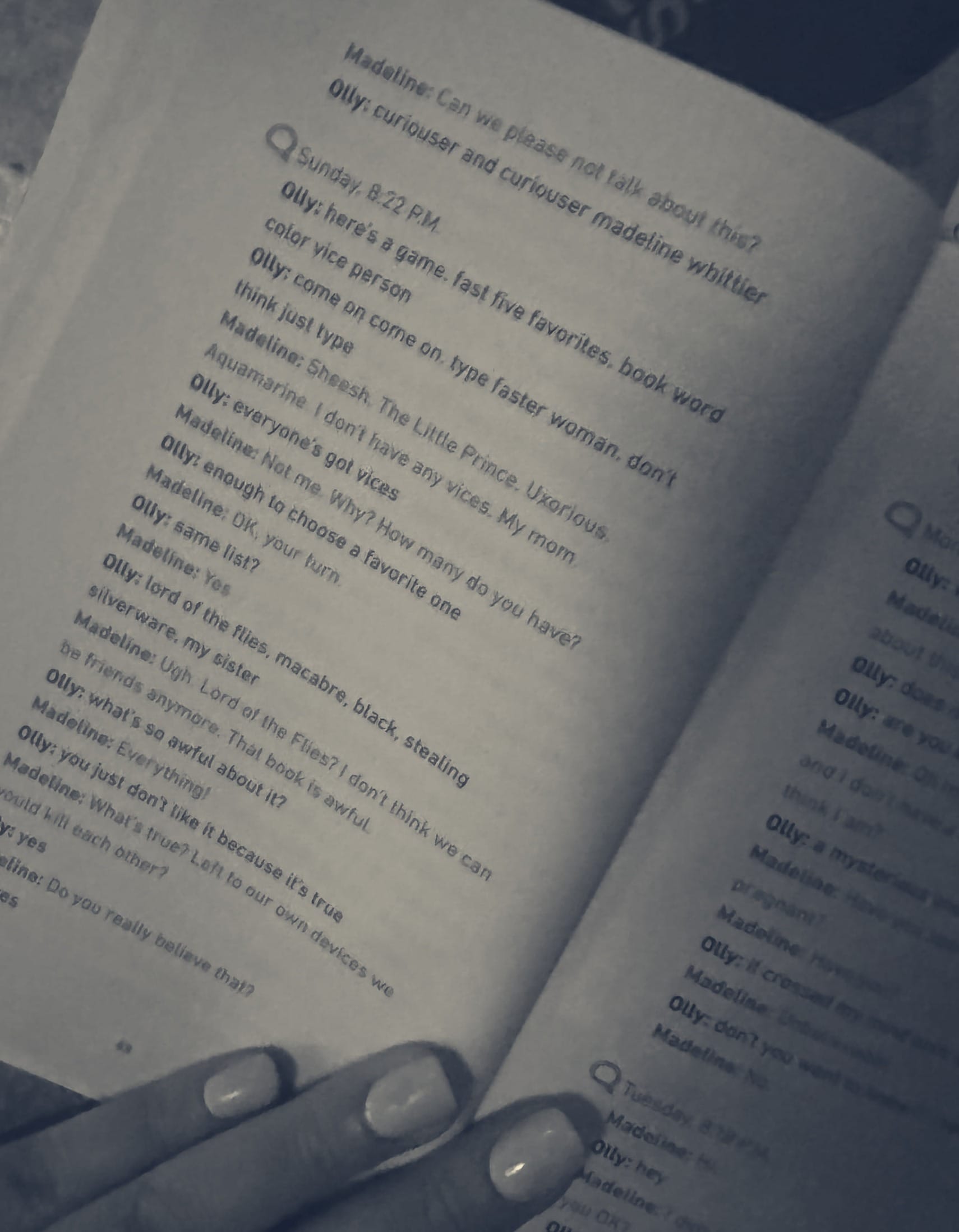 fake nails on an open book